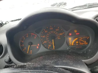 2003 Toyota Celica GT z VIN JTDDR32T730157268, wystawiony jako Copart lot #68884804 z przebiegiem 209 728 mil mil oraz Nie do naprawy • Non repairable. Historia ofert i sprzedaży dostępna na DreamBid. Obrazek 9.