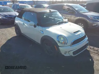 2011 MINI Convertible S with VIN WMWZP3C54BTX82748, listed as a IAAI auction lot 41817396 with 113,458 mi miles and . Bid and sale history available at DreamBid. Image 1.