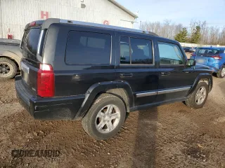 2010 Jeep Commander Limited with VIN 1J4RG5GT6AC113462, listed as a Copart auction lot 82400044 with 189,168 mi miles and Salvage title. Bid and sale history available at DreamBid. Image 3.
