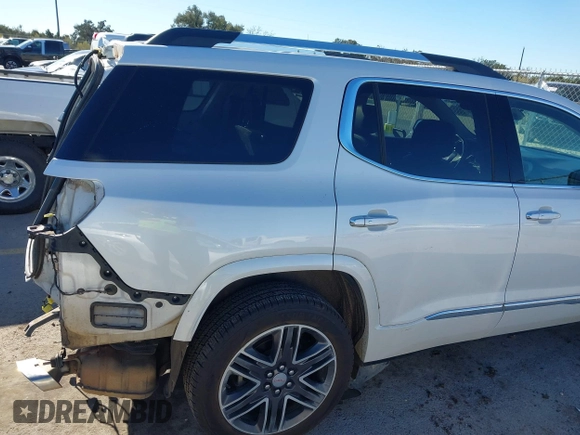 2019 GMC Acadia Denali with VIN 1GKKNPLS0KZ114003, listed as a IAAI auction lot 41246360 with 129,239 mi miles and . Bid and sale history available at carsss.com. Image 19.