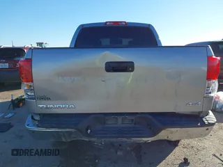 2012 Toyota Tundra 4WD Truck LTD with VIN 5TFHW5F18CX251584, listed as a IAAI auction lot 41054238 with 124,892 mi miles. Bid and sale history available at carsss.com. Image 16.