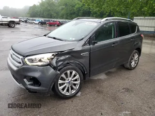 2018 Ford Escape Titanium with VIN 1FMCU9J96JUC84601, listed as a Copart auction lot 59936255 with 89,123 mi miles and Salvage title. Bid and sale history available at DreamBid. Image 1.