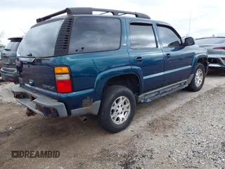 2005 Chevrolet Tahoe Z71 with VIN 1GNEK13Z95R255918, listed as a IAAI auction lot 42033067 with 236,936 mi miles. Bid and sale history available at carsss.com. Image 4.
