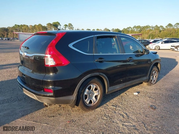 2015 Honda CR-V LX with VIN 2HKRM3H38FH512323, listed as a IAAI auction lot 39161499 with 133,787 mi miles. Bid and sale history available at carsss.com. Image 4.
