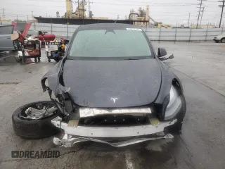 2024 Tesla Model Y with VIN 7SAYGDED1RF098054, listed as a Copart auction lot 44072195 with 16,085 mi miles and Salvage Title. Bid and sale history available at DreamBid. Image 5.