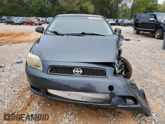 2007 Scion tC Spec z VIN JTKDE167570179636, wystawiony jako Copart lot #51235535 z przebiegiem 184 645 mil mil oraz Szkoda całkowita • Salvage title. Historia ofert i sprzedaży dostępna na DreamBid. Obrazek 5.