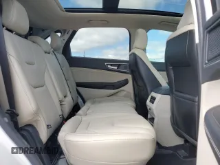 2021 Ford Edge Titanium z VIN 2FMPK4K93MBA52444, wystawiony jako Copart lot #51752835 z przebiegiem 67 137 mil mil oraz Czysty tytuł • Clean title. Historia ofert i sprzedaży dostępna na DreamBid. Obrazek 11.