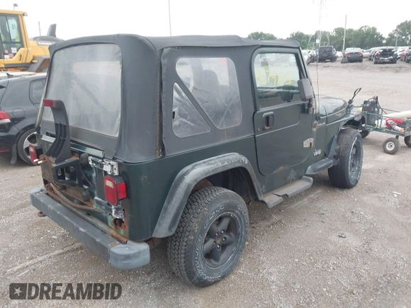 1999 Jeep Wrangler SE z VIN 1J4FY29P7XP479351, wystawiony jako IAAI lot #42797020 z przebiegiem 171 598 mil mil oraz . Historia ofert i sprzedaży dostępna na DreamBid. Obrazek 4.
