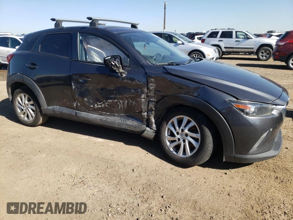 2017 Mazda CX-3 Sport with VIN JM1DKDB79H0142498, listed as a Copart auction lot 71669774 with 140,817 mi miles and Salvage Title. Bid and sale history available at carsss.com. Image 4.