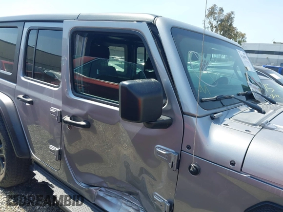2021 Jeep Wrangler Unlimited Sport Altitude with VIN 1C4HJXDGXMW662493, listed as a IAAI auction lot 41288957 with 64,808 mi miles and . Bid and sale history available at DreamBid. Image 14.