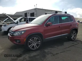 2013 Volkswagen Tiguan SE z VIN WVGBV7AX6DW013736, wystawiony jako Copart lot #82629374 z przebiegiem 123 318 mil mil oraz Czysty tytuł • Clean title. Historia ofert i sprzedaży dostępna na DreamBid. Obrazek 1.