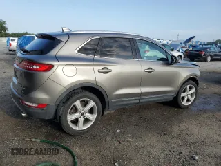 2017 Lincoln MKC Premiere z VIN 5LMCJ1C95HUL16078, wystawiony jako Copart lot #55853005 z przebiegiem 114 821 mil mil oraz Szkoda całkowita • Salvage title. Historia ofert i sprzedaży dostępna na DreamBid. Obrazek 3.