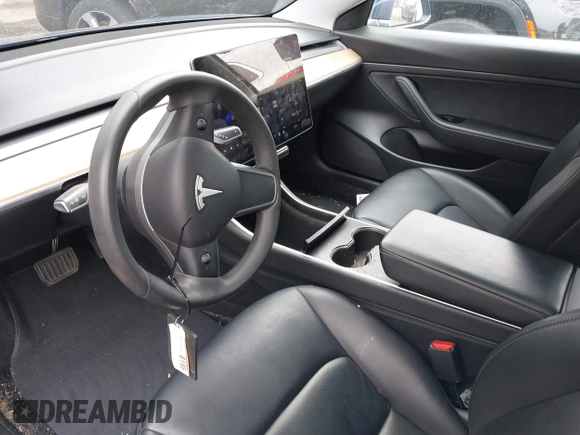 2020 Tesla Model 3 Standard Range Plus with VIN 5YJ3E1EA1LF658521, listed as a IAAI auction lot 41804722 with 83,248 mi miles and . Bid and sale history available at DreamBid. Image 5.