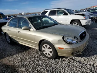 2004 Hyundai Sonata with VIN KMHWF25S44A973750, listed as a Copart auction lot 84761474 with 163,040 mi miles and Salvage Title. Bid and sale history available at carsss.com. Image 4.