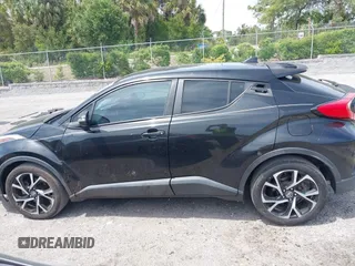 2018 Toyota C-HR XLE with VIN NMTKHMBX0JR008423, listed as a IAAI auction lot 42091445 with 124,811 mi miles. Bid and sale history available at carsss.com. Image 14.