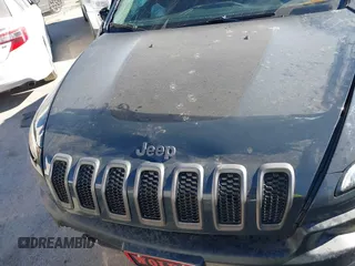 2017 Jeep Cherokee Trailhawk L Plus with VIN 1C4PJMBBXHW634944, listed as a IAAI auction lot 41022673 with 116,542 mi miles. Bid and sale history available at carsss.com. Image 10.