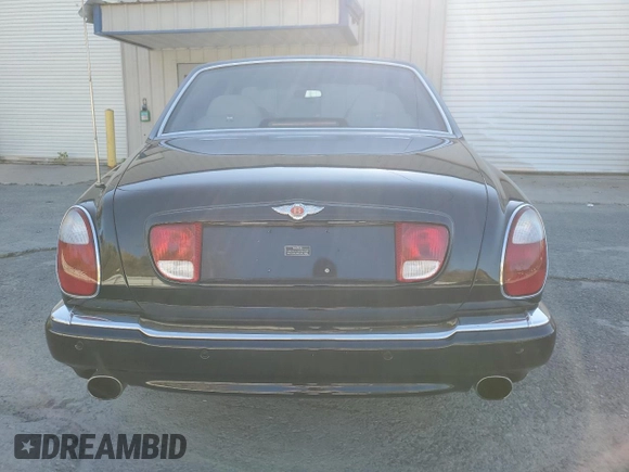 2001 Bentley Arnage with VIN SCBLC31E21CX05644, listed as a Copart auction lot 77706154 with 57,446 mi miles and Clean Title. Bid and sale history available at DreamBid. Image 6.