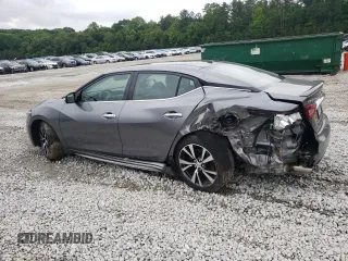 2016 Nissan Maxima S with VIN 1N4AA6AP9GC900863, listed as a Copart auction lot 56287095 with 126,366 mi miles and Salvage title. Bid and sale history available at DreamBid. Image 2.