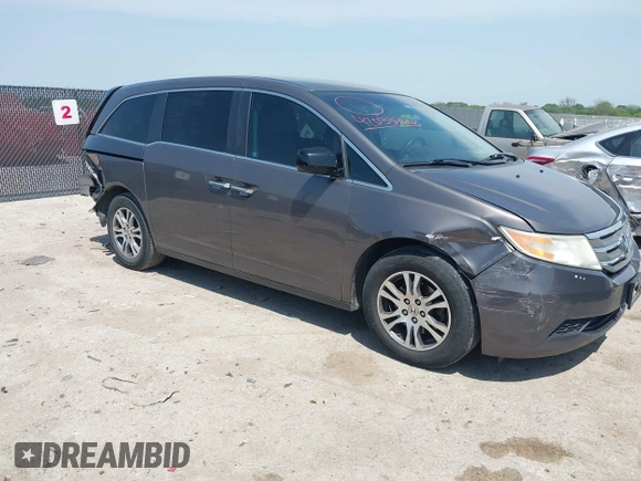 2012 Honda Odyssey EX with VIN 5FNRL5H41CB011940, listed as a IAAI auction lot 42033966 with 182,996 mi miles and . Bid and sale history available at DreamBid. Image 1.