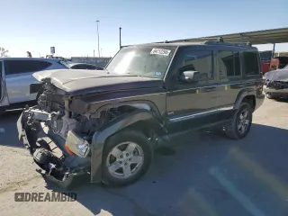 2006 Jeep Commander with VIN 1J8HH48K26C263986, listed as a Copart auction lot 84712294 with 216,923 mi miles and Salvage title. Bid and sale history available at DreamBid. Image 1.