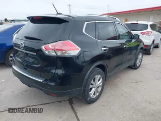 2015 Nissan Rogue SV with VIN KNMAT2MT6FP575909, listed as a IAAI auction lot 42178443 with 141,944 mi miles and . Bid and sale history available at carsss.com. Image 4.
