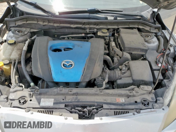 2012 Mazda 3 i Touring with VIN JM1BL1L74C1577899, listed as a Copart auction lot 59716435 with 132,718 mi miles and Salvage title. Bid and sale history available at DreamBid. Image 11.