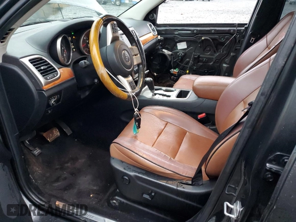 2011 Jeep Grand Cherokee Overland with VIN 1J4RS6GG5BC588562, listed as a Copart auction lot 84805424 with 150,030 mi miles and Salvage Title. Bid and sale history available at DreamBid. Image 7.