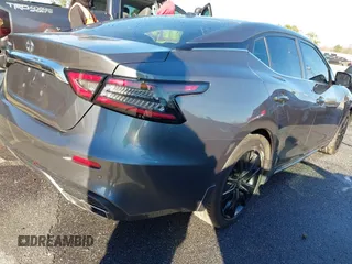 2020 Nissan Maxima S with VIN 1N4AA6BV7LC381254, listed as a IAAI auction lot 41246789 with 73,562 mi miles and . Bid and sale history available at DreamBid. Image 4.