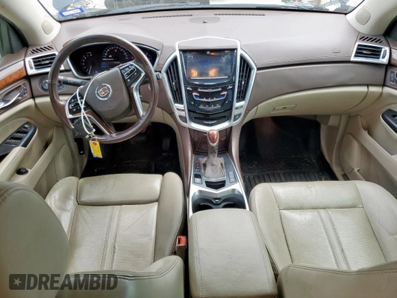 2014 Cadillac SRX Performance Collection с VIN 3GYFNCE34ES580069, выставлен на аукционе Copart как лот 60662415 с пробегом 141 107 миль миль и Списание • Salvage title. История ставок и продаж доступна на DreamBid. Изображение 8.