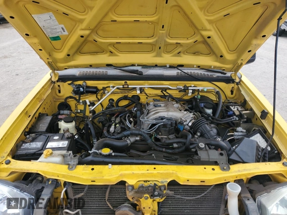 2002 Nissan Frontier XE with VIN 1N6ED29X72C389062, listed as a Copart auction lot 50712195 with 212,403 mi miles and Salvage title. Bid and sale history available at DreamBid. Image 12.