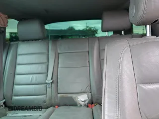 2004 Volkswagen Touareg with VIN WVGCM67L04D027410, listed as a Copart auction lot 79044964 with 100,509 mi miles and Salvage title. Bid and sale history available at DreamBid. Image 10.