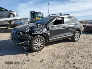 2016 Volkswagen Touareg Sport with VIN WVGEF9BP9GD010964, listed as a Copart auction lot 85800844 with 157,563 mi miles and Salvage Title. Bid and sale history available at DreamBid. Image 1.