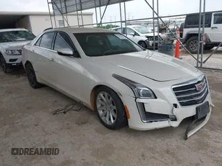 2014 Cadillac CTS RWD z VIN 1G6AP5SXXE0182114, wystawiony jako IAAI lot #42157993 z przebiegiem 132 507 mil mil oraz . Historia ofert i sprzedaży dostępna na DreamBid. Obrazek 1.