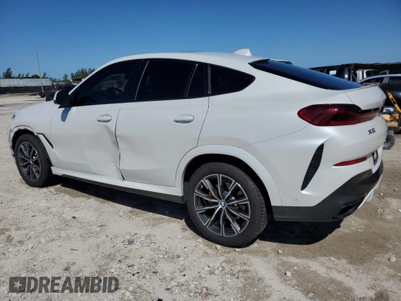 2022 BMW X6 xDrive40i with VIN 5UXCY6C06N9J13344, listed as a Copart auction lot 49278715 with 83,632 mi miles and Clean Title. Bid and sale history available at carsss.com. Image 2.