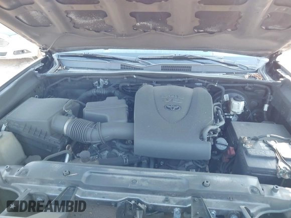 2021 Toyota Tacoma SR z VIN 5TFCZ5AN3MX272033, wystawiony jako IAAI lot #41689129 z przebiegiem Nie podano mil oraz . Historia ofert i sprzedaży dostępna na DreamBid. Obrazek 10.