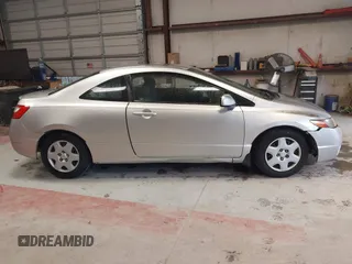 2006 Honda Civic Cpe LX with VIN 2HGFG126X6H532696, listed as a IAAI auction lot 42016264 with 209,509 mi miles. Bid and sale history available at carsss.com. Image 14.
