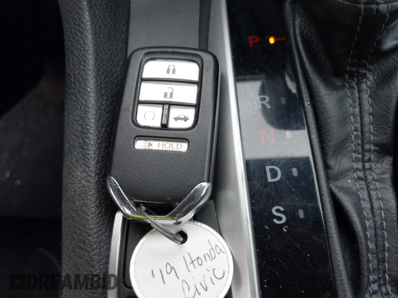 2019 Honda Civic Sport with VIN 19XFC2F81KE034047, listed as a IAAI auction lot 41995614 with 91,303 mi miles and . Bid and sale history available at DreamBid. Image 11.