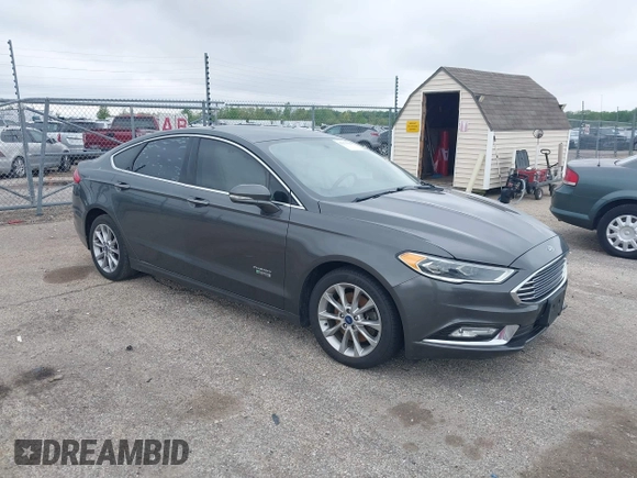 2017 Ford Fusion Energi SE with VIN 3FA6P0PU9HR227932, listed as a IAAI auction lot 42177500 with 106,938 mi miles. Bid and sale history available at carsss.com. Image 1.