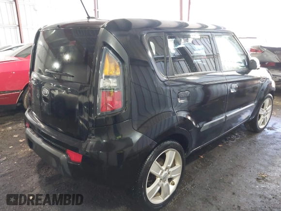 2010 Kia Soul + with VIN KNDJT2A21A7095510, listed as a IAAI auction lot 41879972 with 212,538 mi miles. Bid and sale history available at carsss.com. Image 4.