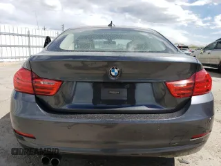2015 BMW 4 Series 428i z VIN WBA4A5C53FG051038, wystawiony jako Copart lot #54909705 z przebiegiem 101 536 mil mil oraz Nie do naprawy • Non repairable. Historia ofert i sprzedaży dostępna na DreamBid. Obrazek 6.