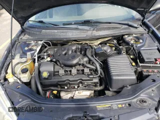 2004 Chrysler Sebring Touring z VIN 1C3AL56R64N291602, wystawiony jako Copart lot #71096534 z przebiegiem 98 772 mil mil oraz Szkody całkowita. Historia ofert i sprzedaży dostępna na DreamBid. Obrazek 11.