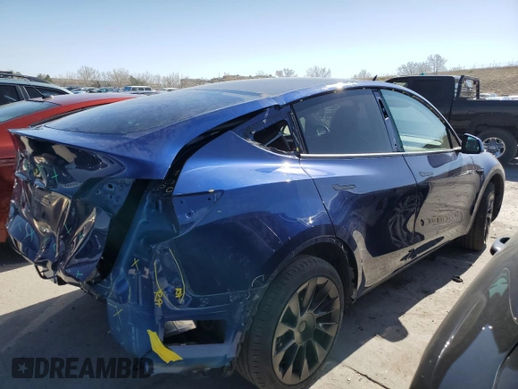 2023 Tesla Model Y Long Range with VIN 7SAYGAEE6PF689615, listed as a Copart auction lot 50999385 with 16,514 mi miles and Salvage Title. Bid and sale history available at DreamBid. Image 3.