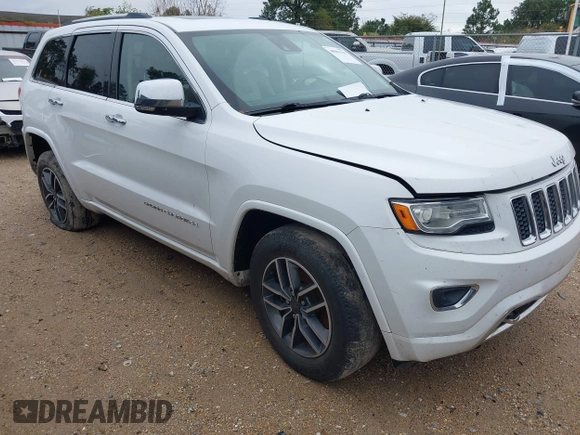 2014 Jeep Grand Cherokee Overland with VIN 1C4RJECG4EC543092, listed as a IAAI auction lot 40981315 with 149,096 mi miles. Bid and sale history available at carsss.com. Image 1.