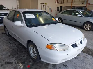 2000 Hyundai Elantra GLS z VIN KMHJF35F7YU054638, wystawiony jako IAAI lot #40931154 z przebiegiem 166 893 mil mil oraz . Historia ofert i sprzedaży dostępna na DreamBid. Obrazek 1.
