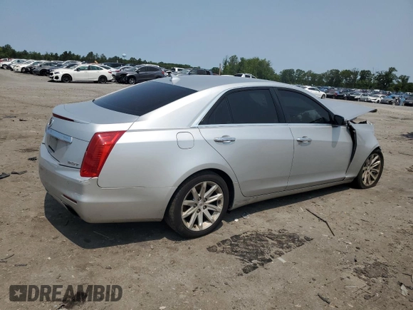 2014 Cadillac CTS Luxury AWD with VIN 1G6AX5SX5E0129143, listed as a Copart auction lot 58914015 with 131,465 mi miles and Salvage title. Bid and sale history available at DreamBid. Image 3.