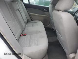 2012 Ford Fusion SE z VIN 3FAHP0HA4CR185059, wystawiony jako Copart lot #56875985 z przebiegiem 173 644 mil mil oraz Nie do naprawy. Historia ofert i sprzedaży dostępna na DreamBid. Obrazek 10.