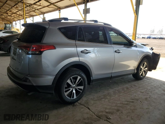 2018 Toyota RAV4 XLE with VIN JTMRFREV1JJ213808, listed as a Copart auction lot 54437805 with 56,972 mi miles and Salvage Title. Bid and sale history available at DreamBid. Image 3.