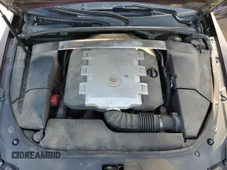 2009 Cadillac CTS AWD z VIN 1G6DS57V390110289, wystawiony jako Copart lot #49331995 z przebiegiem 146 254 mil mil oraz Szkoda całkowita • Salvage title. Historia ofert i sprzedaży dostępna na DreamBid. Obrazek 13.