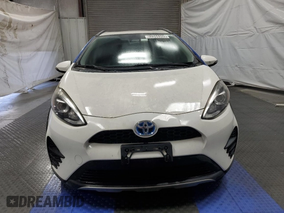 2018 Toyota Prius One z VIN JTDKDTB36J1599469, wystawiony jako Copart lot #52555355 z przebiegiem 70 316 mil mil oraz Czysty tytuł • Clean title. Historia ofert i sprzedaży dostępna na DreamBid. Obrazek 5.