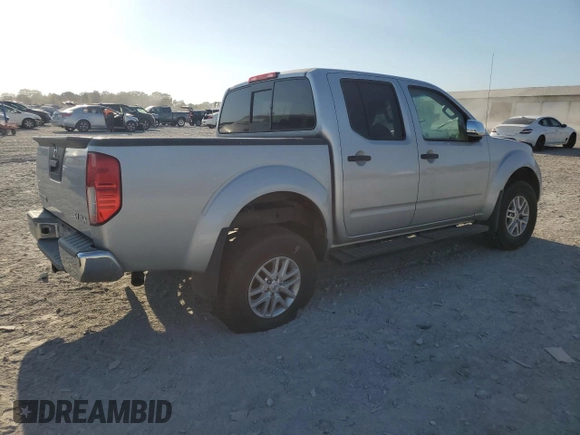 2015 Nissan Frontier S with VIN 1N6AD0EV3FN705610, listed as a Copart auction lot 77530764 with 165,782 mi miles and Salvage title. Bid and sale history available at DreamBid. Image 3.